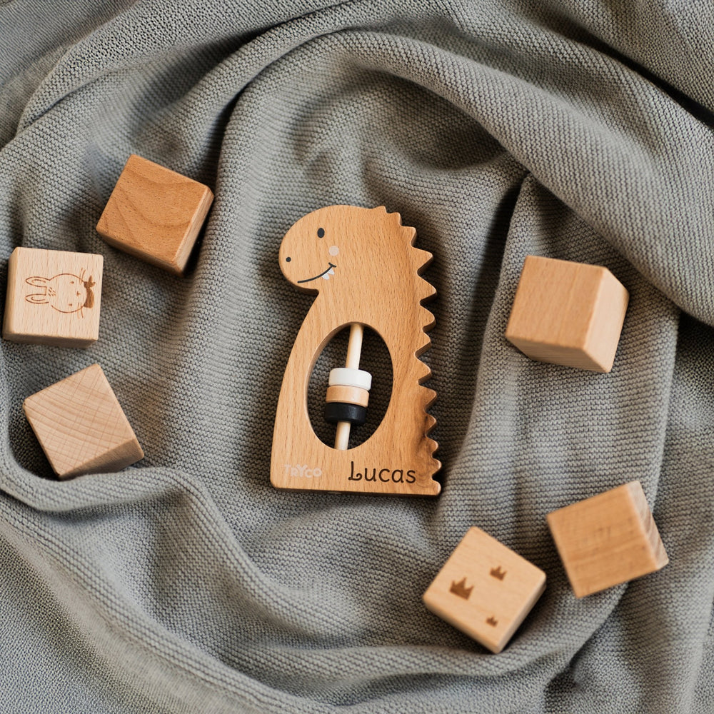 Dino Rassel aus Holz - Muckelmeister