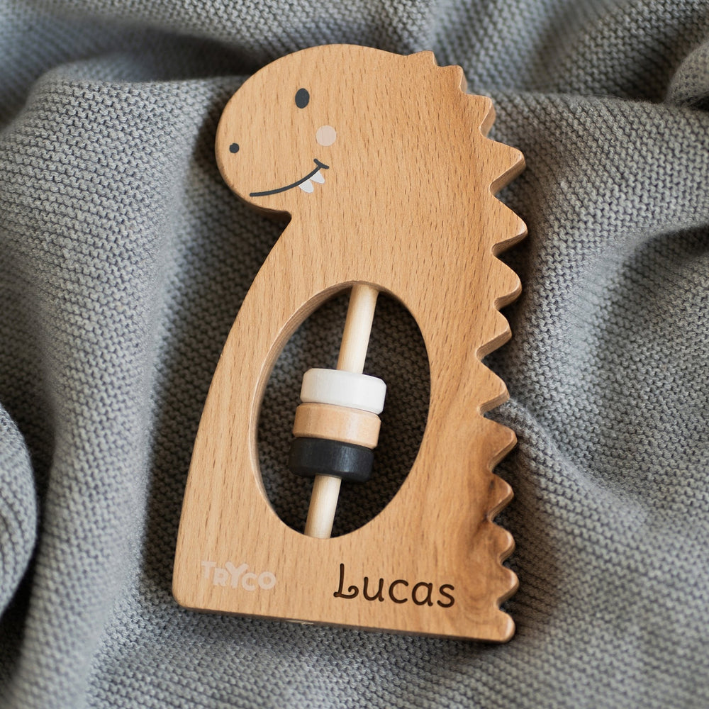 Dino Rassel aus Holz - Muckelmeister
